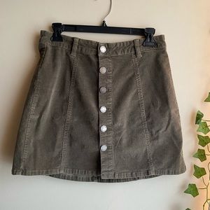 Dark green corduroy button front skirt